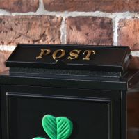 Close up of gold "POST" lettering on Lid