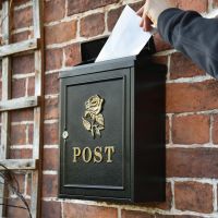 Letter being posted into "Gold Rose" Wall Mounted Post Box 