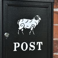 Close up of "Sheep" Motif on Wall Mounted Post Box 