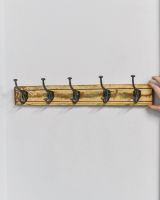Scale of rustic finish reclaimed coat hooks
