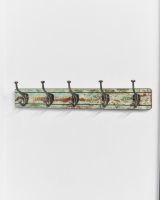 Third finish on rustic finish coat hooks