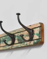 Close up of iron coat hook detail on recycled coat hooks Close up of iron coat hook detail on recycled coat hooks