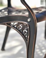 Ornate Detailing in the Arches of the Chairs 