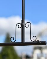 Scroll detail on Witch on her broom weathervane Scroll detail on Witch on her broom weathervane
