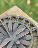 Close Up Of Numbers On dragonfly Sundial 