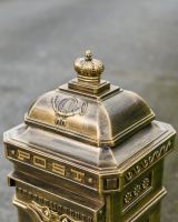 Top details of “Raventree” Deluxe Camden Free Standing Post Box in Brushed Gold