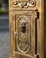 Lockable parcel draw on “Raventree” Deluxe Camden Free Standing Post Box in Brushed Gold