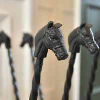 Close up of horse head finials 