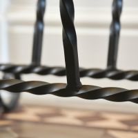 Close up of twisted ironwork on Welly Rack 