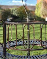 Intricate details crafted all around the bench.