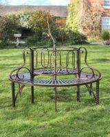 Bronze ornate antique tree bench.