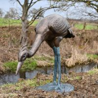 Verdigris Finish Crane Sculpture in Outdoor Setting 