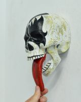 Scale image of handpainted heavy metal skull ornament