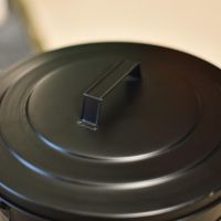 Close up of matching Lid on Ash Bucket  Close up of matching Lid on Ash Bucket