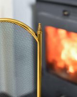 Close-Up of Dynasty Four Fold Fire Screen in Polished Brass in Situ Close-Up of Dynasty Four Fold Fire Screen in Polished Brass in Situ
