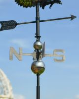 Close up of arrow detail on eagle weathervane