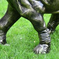 Close-up of the Feet on the Elephant Calf Water Fountain