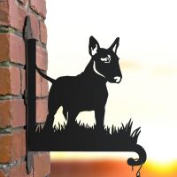 English bull terrier hanging basket bracket in the sunset