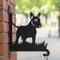 English bull terrier hanging basket bracket in the park