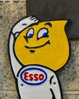 Close up of hand painted cast iron wall sign