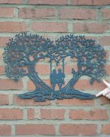 Eternal Canopy Silhouette Garden Wall Art to scale with hand in shot