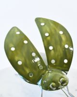 Close up of face and wing detail on interior ornament