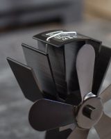 Close up of blades on heat powered five blade fan Close up of blades on heat powered five blade fan