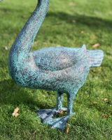 Close up of body and feet of swan sculpture