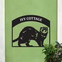 Steel Ferret House Name Sign On Green Wall 