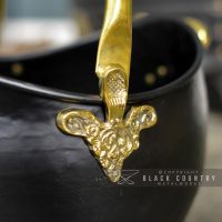 Brass Ornate Design on the Side of the Coal Bucket