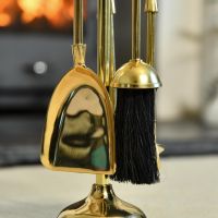 Close up of Polished Brass Companion Set Tools Close up of Polished Brass Companion Set Tools