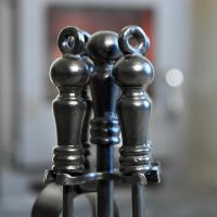 Close up of traditional companion set handles Close up of traditional companion set handles