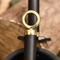 Close up of ring finial on brush