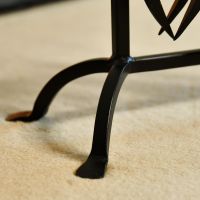 Close up of Black Iron Feet on Companion Set Stand 