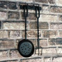 Chestnut roaster and Fork Hanging on the Rack