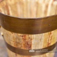 Close-up of the Bronze Finish on the Side of the Log Basket