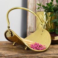 Stylish polished brass match holder with hinged carry handle