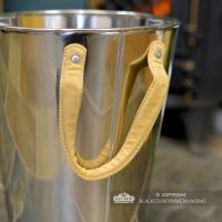 Close-up of the Suede Handles on the Sides of the Log Holder Close-up of the Suede Handles on the Sides of the Log Holder