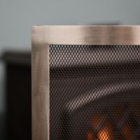 Detailed image of black mesh & chrome finish