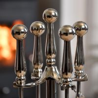 Close up of Polished Steel Companion Set Handles  Close up of Polished Steel Companion Set Handles