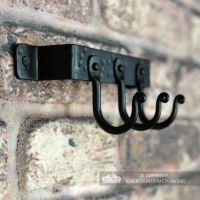 View of the hooks on the Fireside Tool Rack