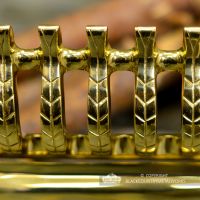 Close-up of the Polished Brass Finish on the Fire Front
