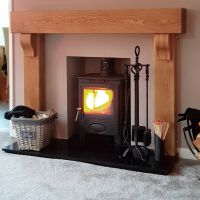 Blacksmith Knot Iron Companion Set next to log burner