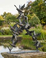 Flock of Flying Geese Garden Sculpture ai illustration