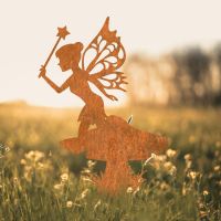 Flower Fairy With Wand Silhouette in Use in a Field Flower Fairy With Wand Silhouette in Use in a Field