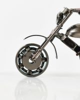 front wheel close up of motorbike sculpture  front wheel close up of motorbike sculpture