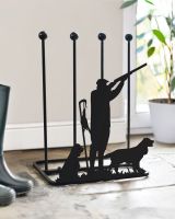Steel boot rack with hunter and two springer spaniel silhouettes on the front Steel boot rack with hunter and two springer spaniel silhouettes on the front