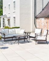 Wide shot of full "Elmswood" five seater furniture set - Sofa, two chairs and two tables