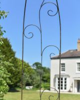 Close up of ornate scrollwork detail on side Close up of ornate scrollwork detail on side