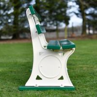 Side view of cream cast iron bench with green wooden slats Side view of cream cast iron bench with green wooden slats